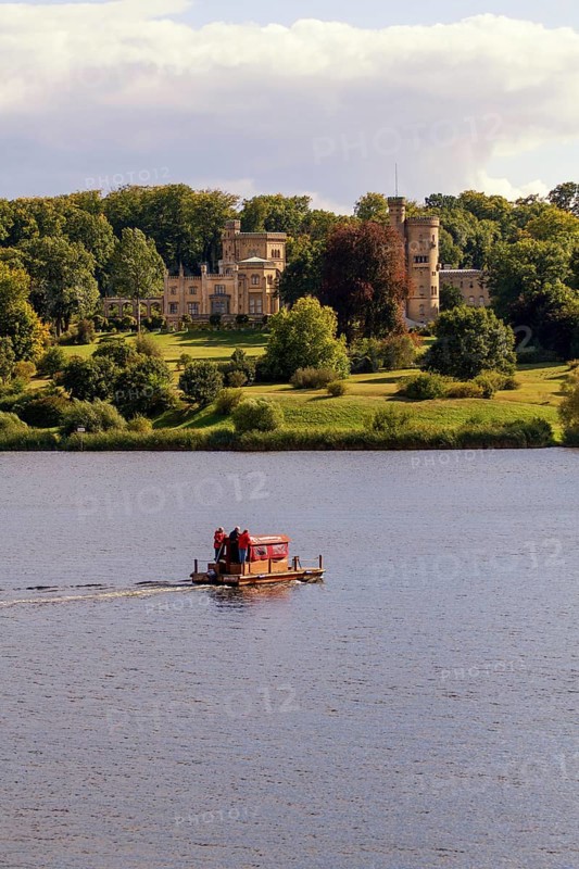 Wooden raft on Lake Glienicke in front of Schloss Babelsberg Castle