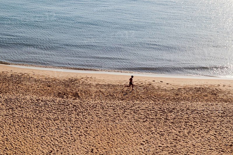 Jogger at the beach