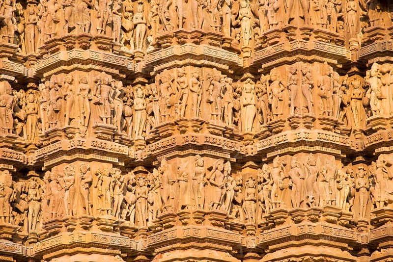 Relief sculptures of gods and men on the facade of the Lakshman Temple