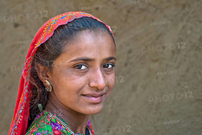 Girl with a headscarf and jewellery
