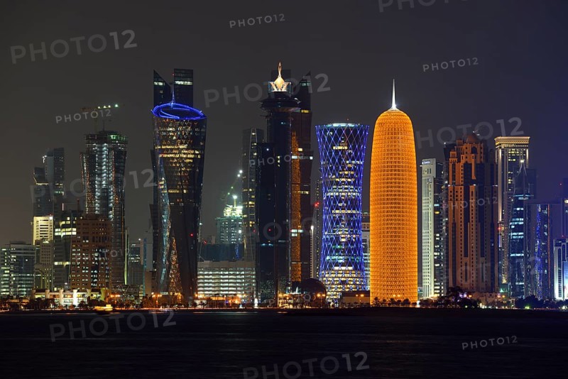 Skyline of Doha at night with the Al Bidda Tower