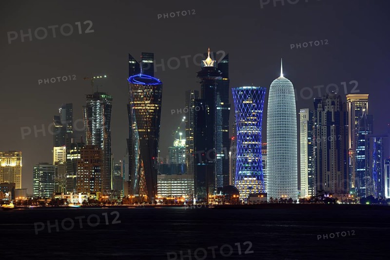 Skyline of Doha at night with the Al Bidda Tower