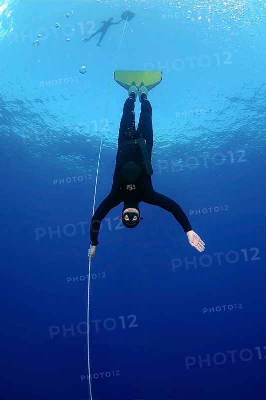 Freediver wearing a monofin