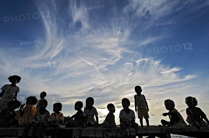 Children on a jetty