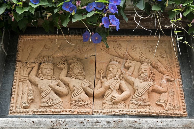 Relief plate with Asian dancers
