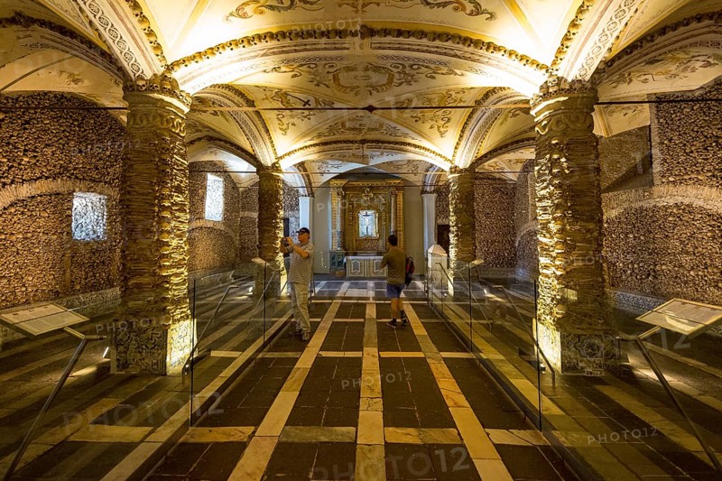 Stacked bones and skulls in the ossuary