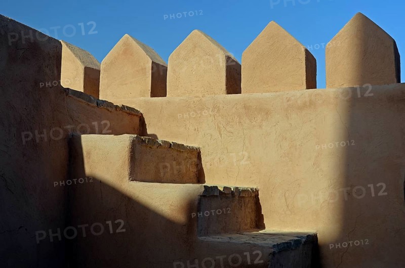 The wall and stairs inside Rustaq Fort