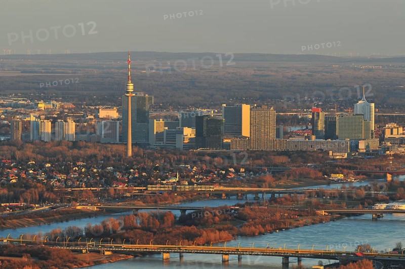 The city of Vienna and the New Danube river at dusk