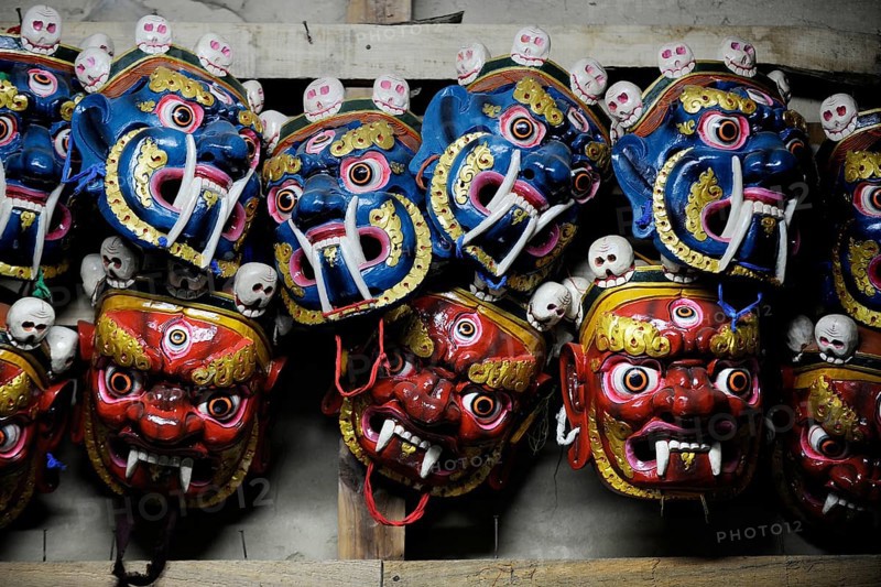 Traditional religious masks in a chamber of Mongar Dzong fortress