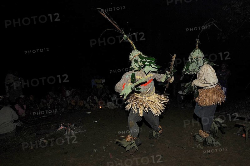 Pygmies of the Bakola people celebrating with song and dance