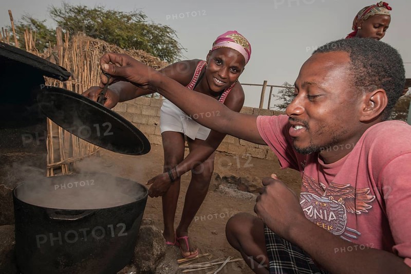 Members of the Rabelados religious community preparing a meal