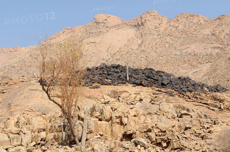 Mountain landscape along a trail to the White Lady rock painting in the Tsisab Gorge