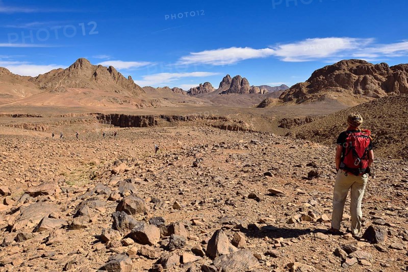 Female hiker standing in the volcanic landscape at Atakor