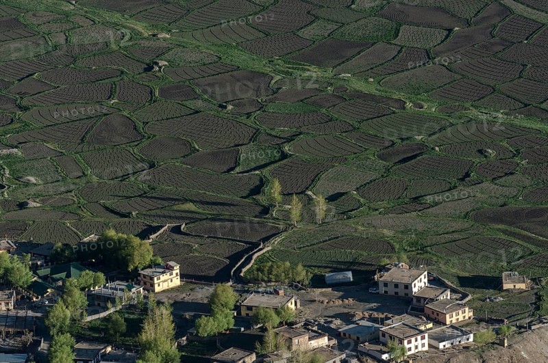 Aerial view of Kaza village and small fields