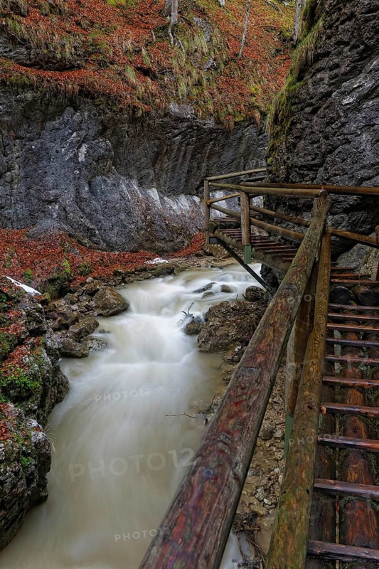 Wooden bridge and a waterfall in Baerenschuetzklamm gorge