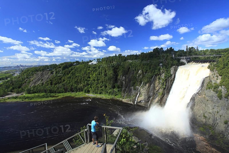 Tourist on viewing platform at Montmorency Falls