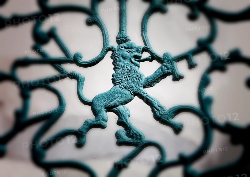 Nassau lion in metal railing