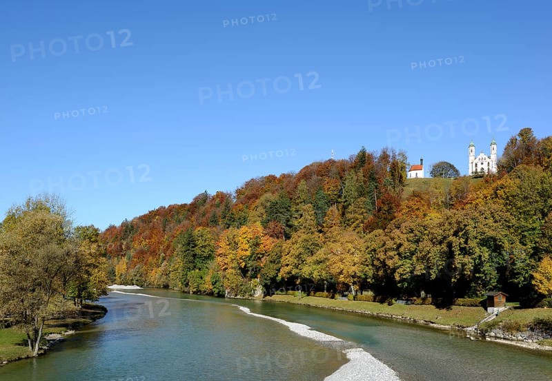 Isar river near Bad Toelz with the St Leonard's Chapel and the church of the Holy Cross