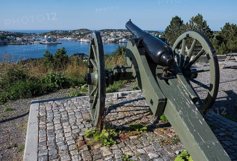 Historic cannon on a hill overlooking the city