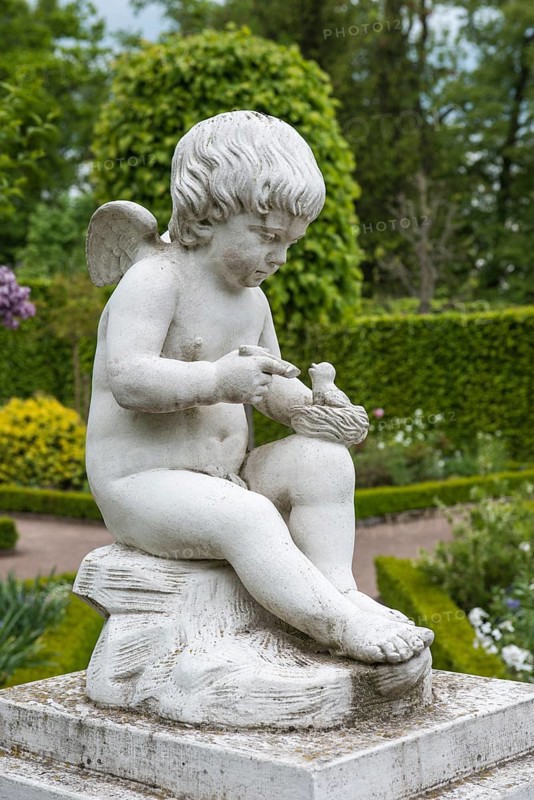 Amor statue in the Russian garden of Schloss Belvedere Palace