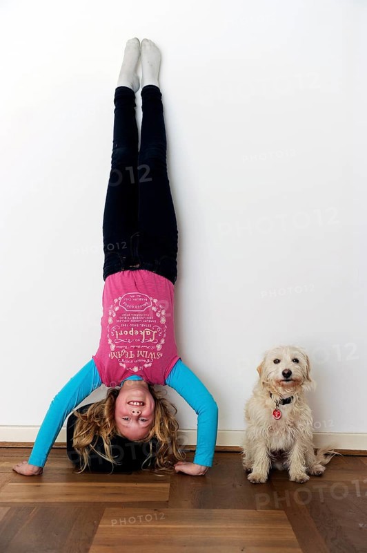 Girl doing a headstand