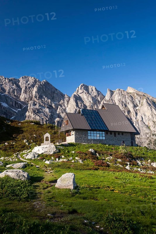 Rifugio Garelli mountain hut in front of the northern face of Punta Marguareis Mountain