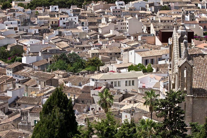Town centre with stone houses and the Church of Sant Salvador