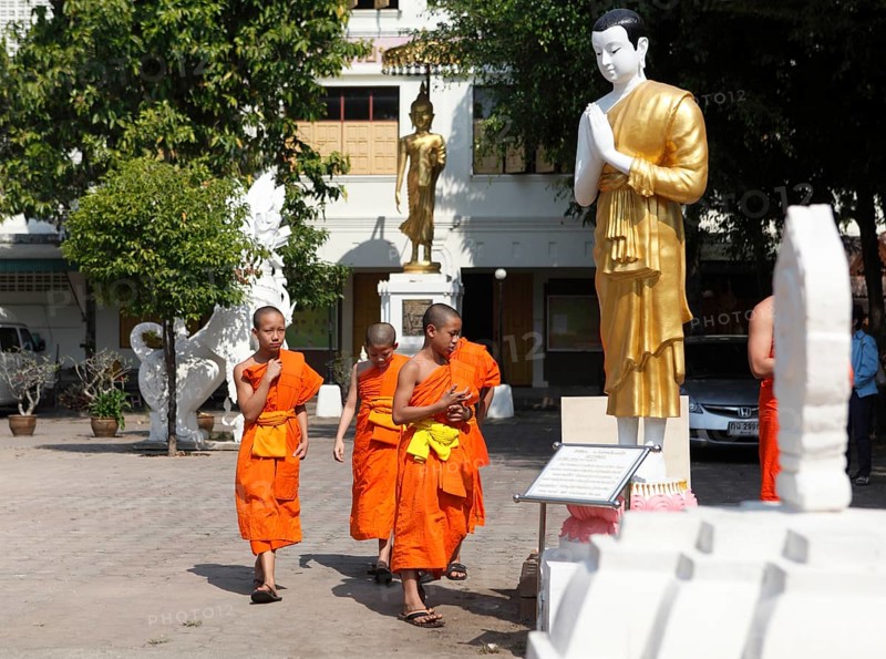 Young monks in the courtyard of the Wat Phra Singha temple