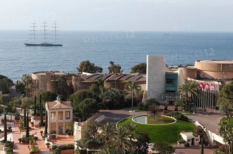 View from the balcony of the Monte Carlo Bay Hotel & Resort over the garden and  Jimmy'z Night Club towards the sea with the large yacht Maltese Falcon