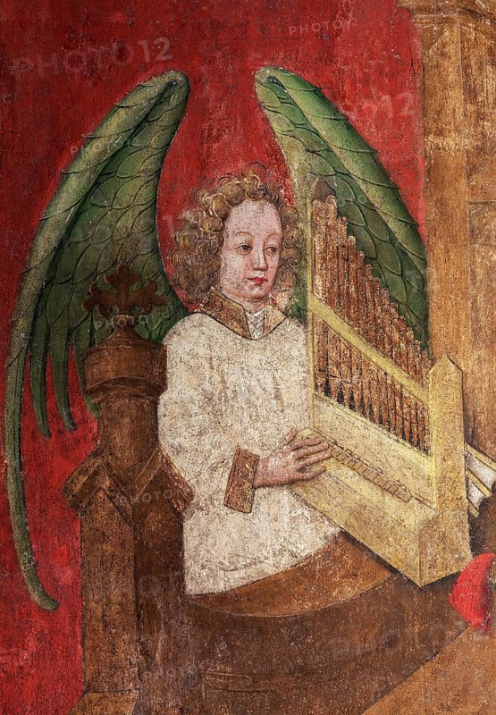 Angel playing an organ