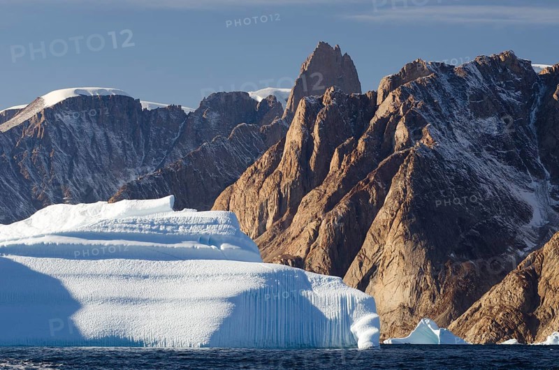 Iceberg in front of the mountain scenery of Øfjord