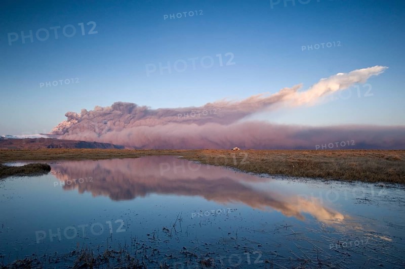 Ash cloud from the Eyjafjallajoekull volcano at sunset