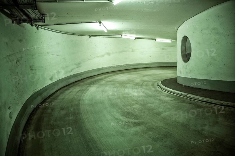 Narrow and dirty access to a multi-storey car park