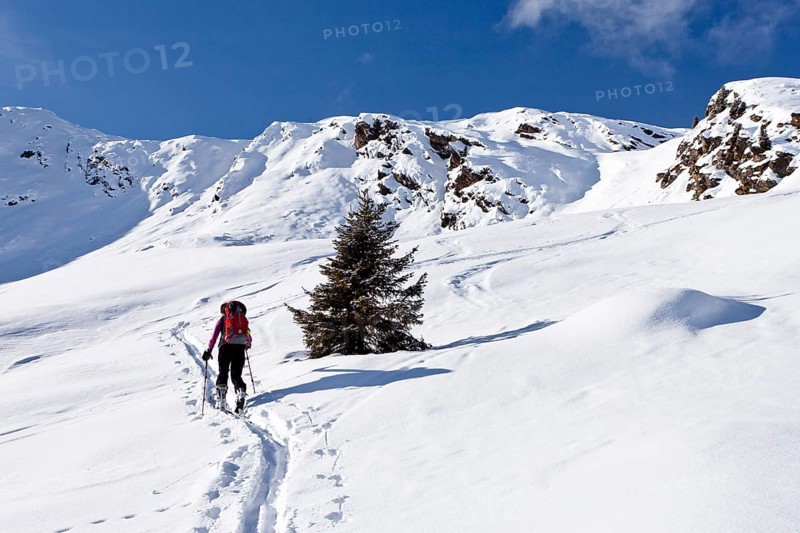Cross-country skier ascending Wurzer Alpenspitz Mountain in the Ridnauntal Valley