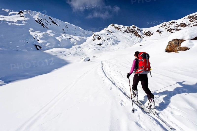 Cross-country skier ascending Wurzer Alpenspitz Mountain in the Ridnauntal Valley