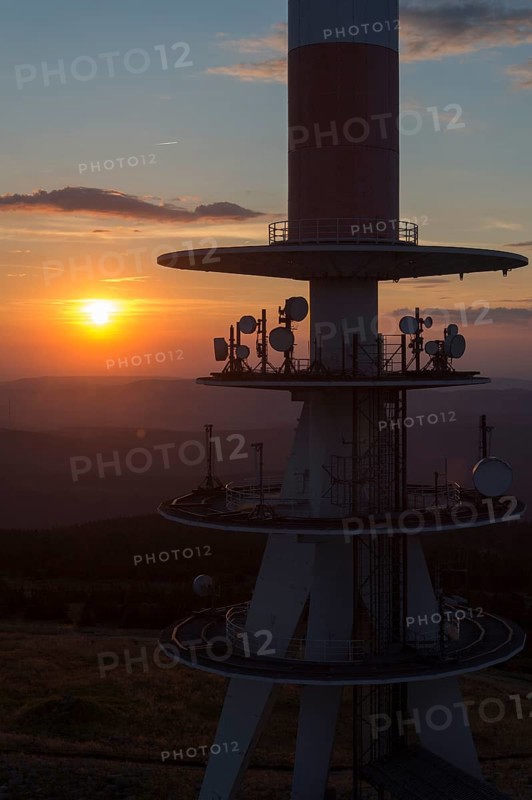 Transmission tower on the summit plateau of Mt Brocken at sunset
