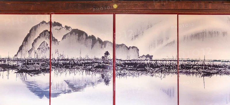 Painting of a landscape on a paper wall