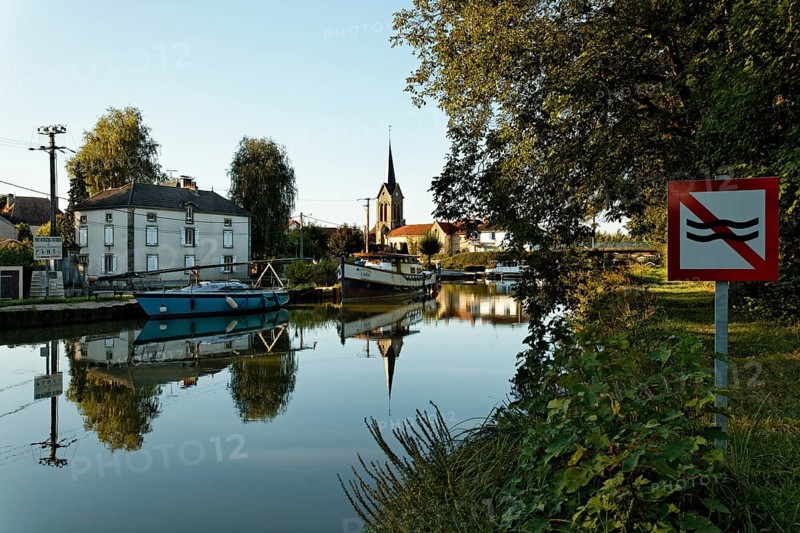 House boat in the harbour on the Canal des Vosges
