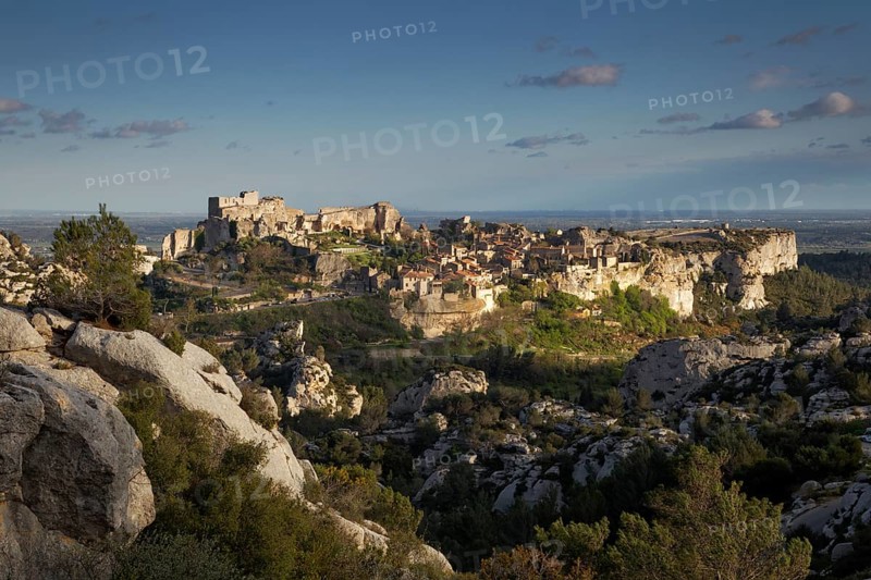 Castle ruins above the village in the evening light