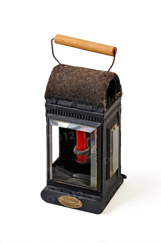 Old signal lantern with a candle from the fire department around 1900