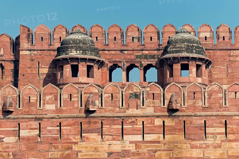 Fortified outer walls with battlements and loopholes