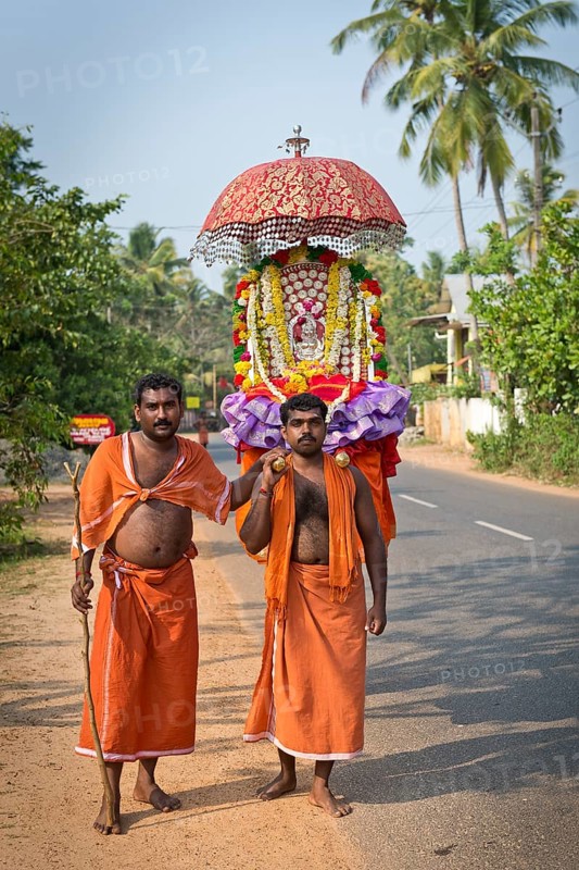 Procession of Hindu pilgrims in honor of a local patron goddess