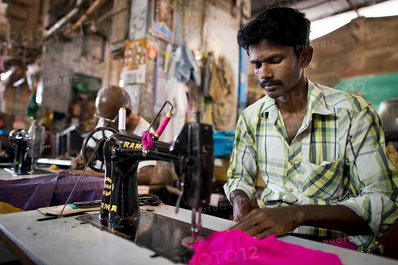 Tailor in a former building of Meenakshi Amman Temple or Sri Meenakshi Sundareswarar Temple