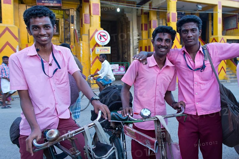 Students in school uniforms standing in front of the entrance to the Ramanathaswami Temple