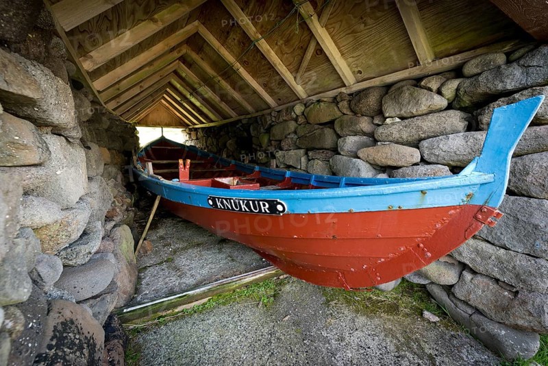 Traditional boat in a shed
