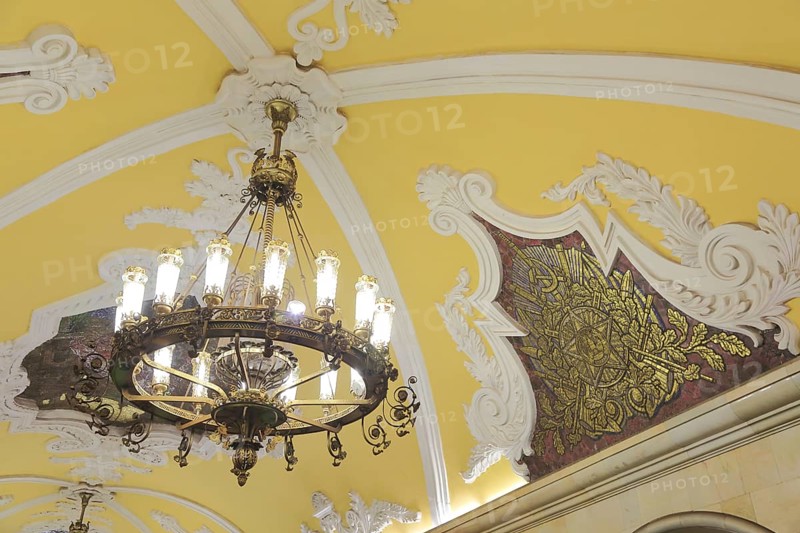 Stucco ceiling with a chandelier
