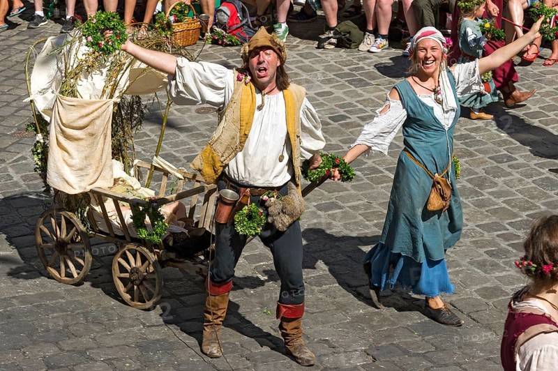Impoverished couple pulling a baby carriage