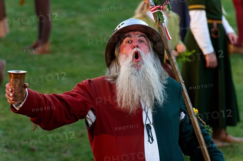 Bailiff holding a cup wearing a medieval costume at the showgrounds