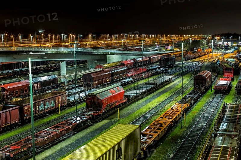 Parked goods wagons on the tracks of the Maschen marshalling yard at night