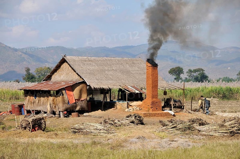 Small sugar mill in the countryside processing sugar cane